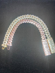 Luxury moissanite cuban link bracelets on a black velvet background