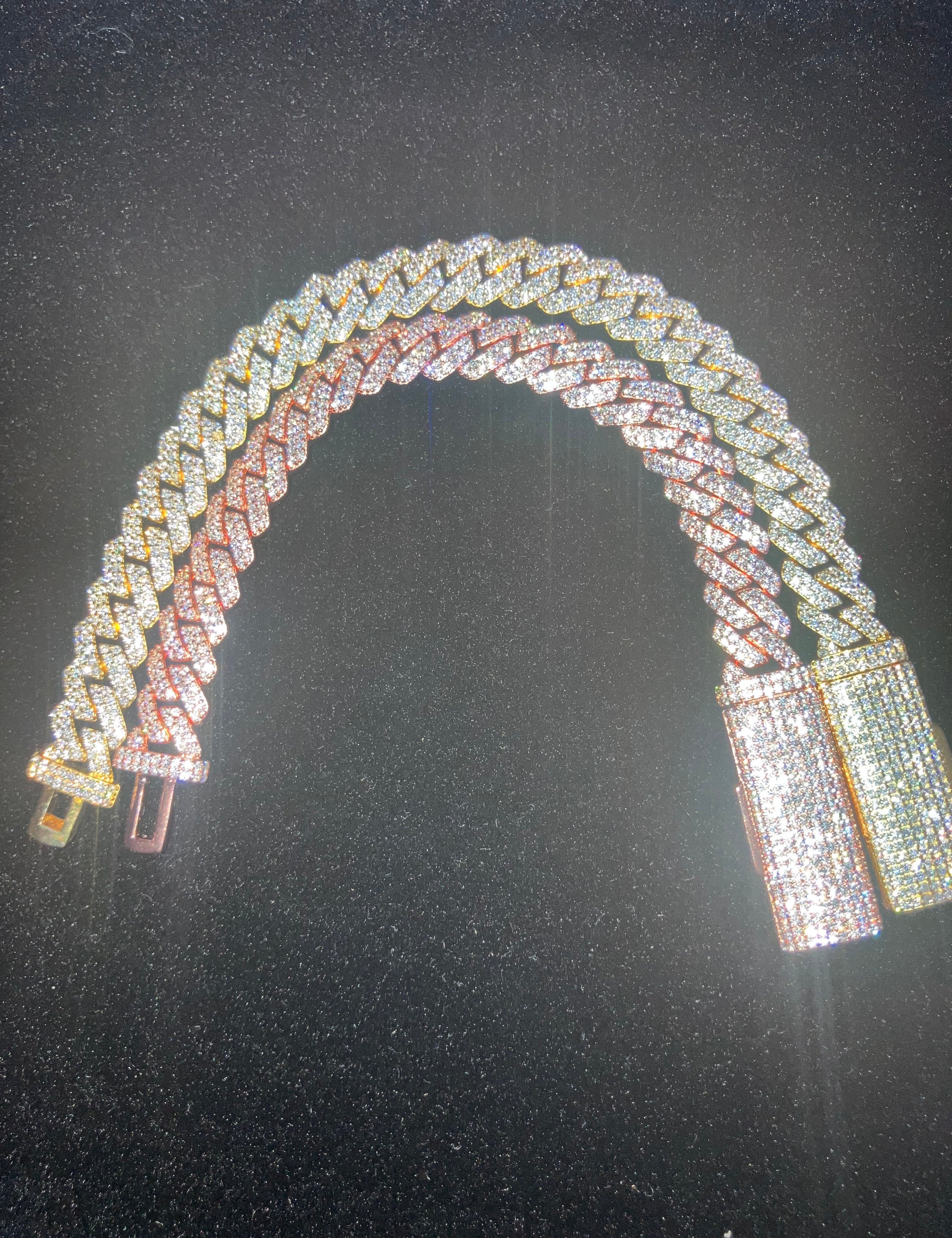Luxury moissanite cuban link bracelets on a black velvet background