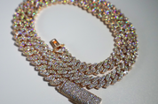 Rose Gold Moissanite Cuban Link Chain 925 Sterling Silver showing brilliant sparkle and warm rose gold finish